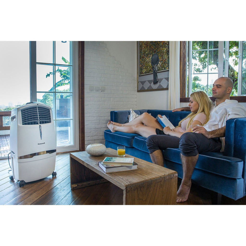 Honeywell 525-729CFM Portable Evaporative Cooler, Fan & Humidifier with Ice Compartment & Remote, CL30XCWW, White