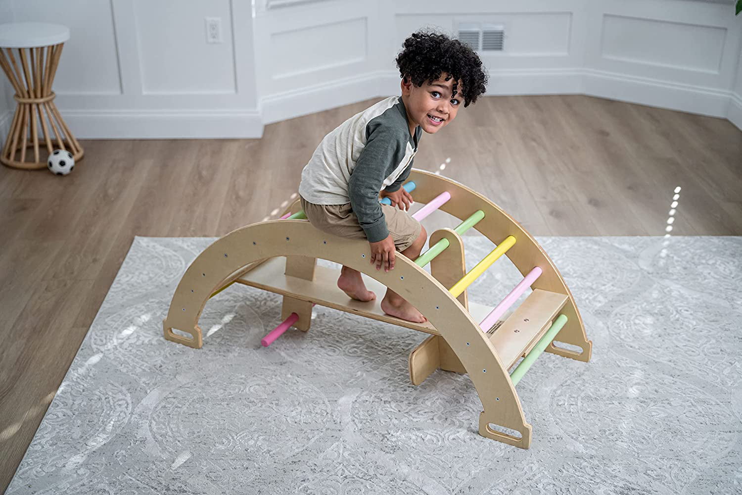 Avenlur BAILIS Seesaw Rocker Climber Arch with Handles and Built in Seat for Toddlers - Montessori Waldorf Style Wooden Colorful Rainbow Arch Climbing Play Structure for Kids (Colored Bars)