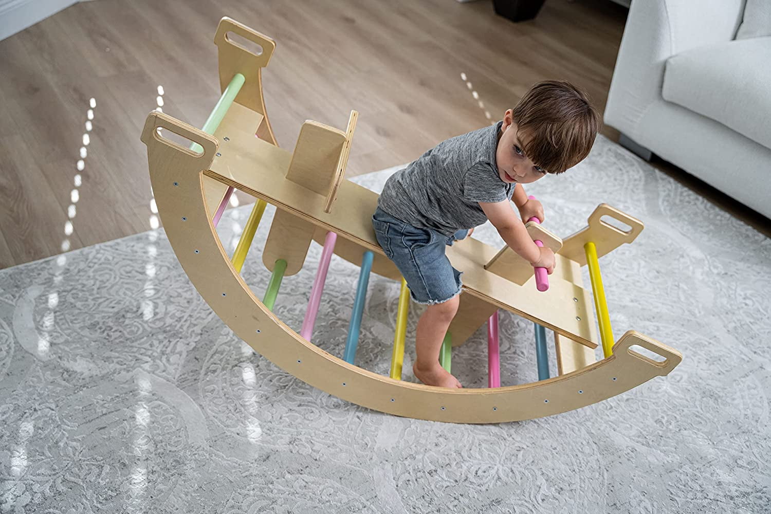 Avenlur BAILIS Seesaw Rocker Climber Arch with Handles and Built in Seat for Toddlers - Montessori Waldorf Style Wooden Colorful Rainbow Arch Climbing Play Structure for Kids (Colored Bars)